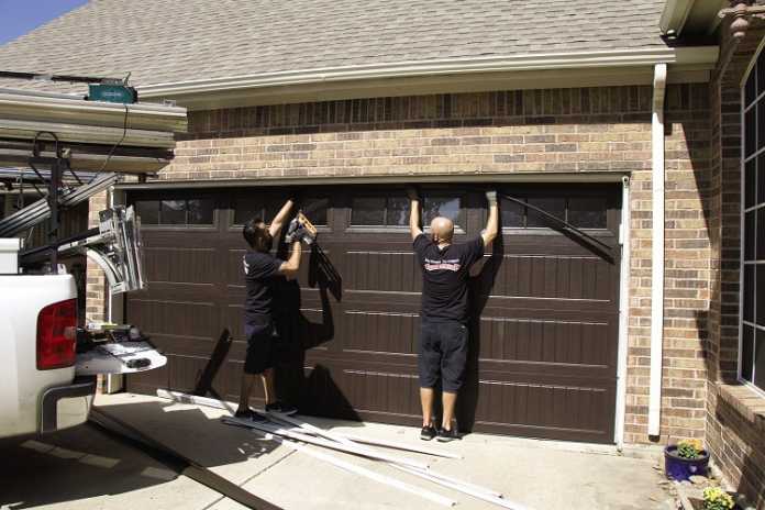 Is it cheaper to repair or replace a garage door