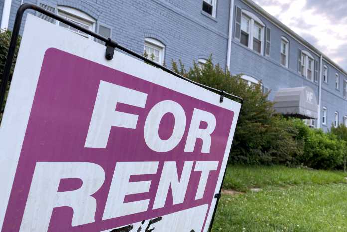 FILE PHOTO: 'For Rent' sign in front of apartment building in Virginia