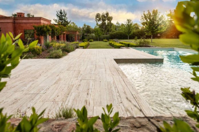 How to Incorporate Hardscaping Into Your Inground Pool Landscape Design